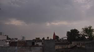 gwalior, Cloudy sky, light drizzle occurred