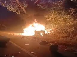 niwadi, Car catches fire , hitting tree